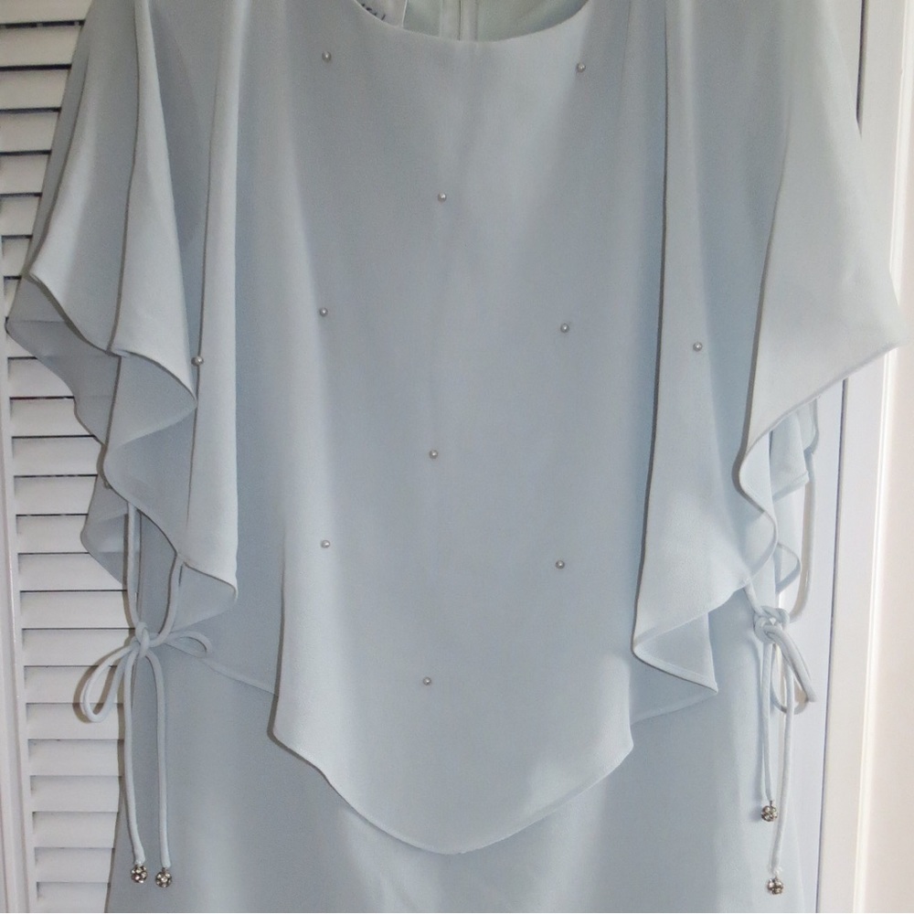 Powder blue dress with cape